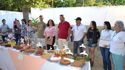 Foto dos pratos e participantes do evento